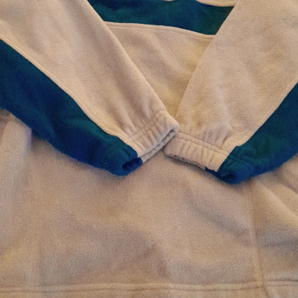 I'm selling a blue sweater  size large and it's blue and grey